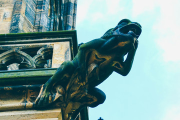 Czech architecture, scary gargoyle sculpture, gothic temple decoration. Medieval art, mystic...