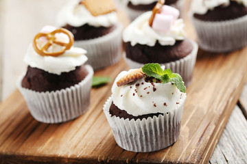 Chocolate cupcakes on a grey wooden table