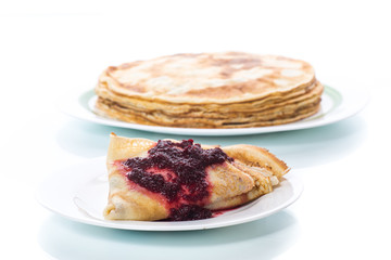 thin delicious pancakes in a plate