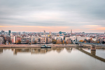 Fototapeta na wymiar Panoramic city view of Novi Sad with buildings in background