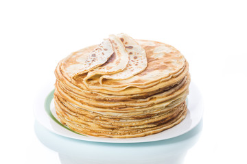 thin delicious pancakes in a plate