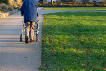 rollator and wheelchair with senior at historical park