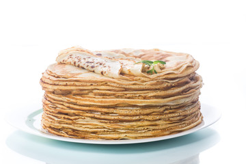 thin delicious pancakes in a plate