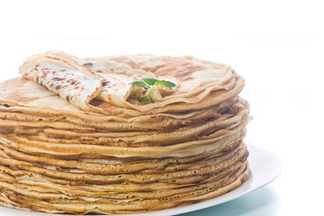 thin delicious pancakes in a plate