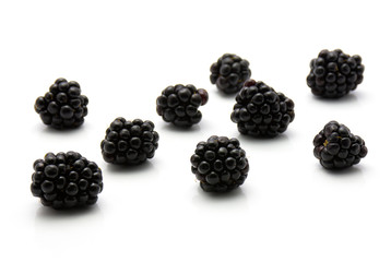 Fresh blackberries isolated on white background.