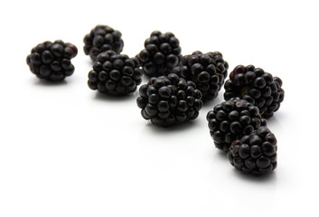 Blackberries isolated on white background fresh collected.