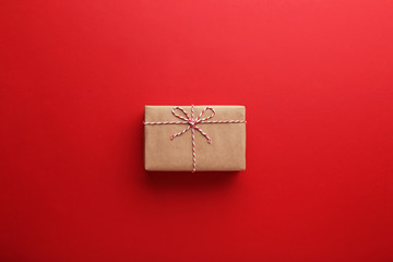 Brown gift box on red background