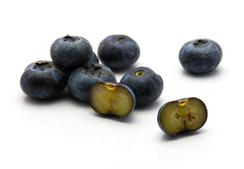 Bog blueberry heap isolated on white background.