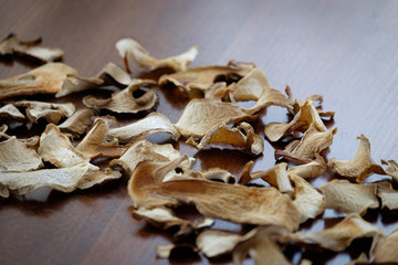 Dried boletus mushroom slices food background texture