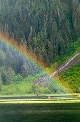 mountain rainbow and waterfall