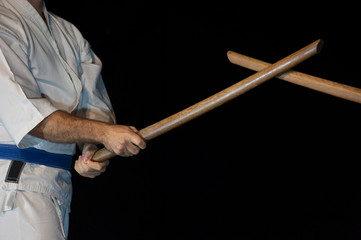 Blue belt aikido fighter in attack position