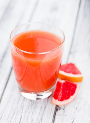 Freshly squeezed Grapefruit Juice (selective focus)