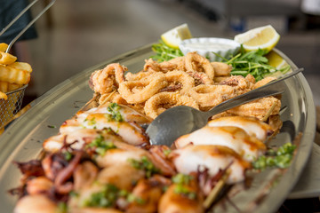 Sea food served on a tray.