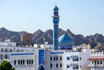 Blue Dome and Minaret of Mutrah Mosque with mountain in Background - Muscat, Oman - obrazy, fototapety, plakaty