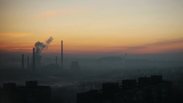 Sunrise in the industrial city. Factory