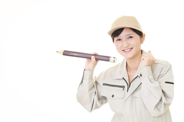 ガッツポーズの女性作業員