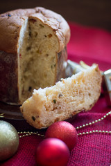 Fototapeta na wymiar Slice of Panettone. Traditional Italian Christmas Cake