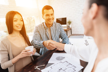 A young couple chooses a house for their family.