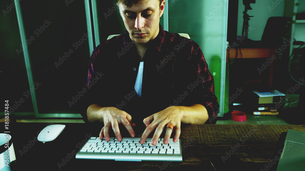 Fototapete A programer hacker trying to breached the computer security by using algorithm source code to exploit weakness in password security