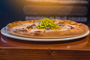 Very tasty pizza in a cafe restaurant