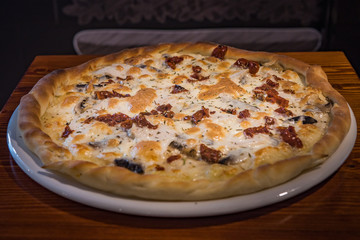 Very tasty pizza in a cafe restaurant