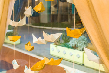 paper boats hanging