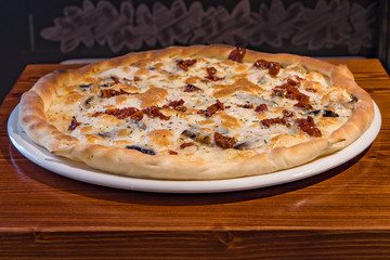 Very tasty pizza in a cafe restaurant