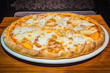Very tasty pizza in a cafe restaurant