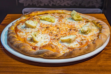 Very tasty pizza in a cafe restaurant