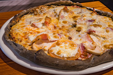 Very tasty pizza in a cafe restaurant