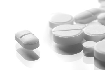 Pharmacy theme, white medicine tablets antibiotic pills.