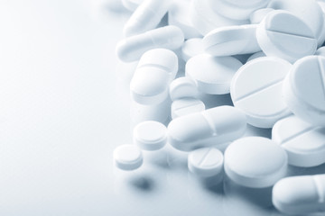 Pharmacy theme, white medicine tablets antibiotic pills.