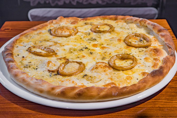 Very tasty pizza in a cafe restaurant
