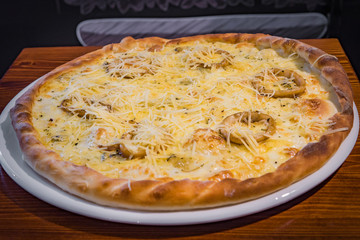Very tasty pizza in a cafe restaurant