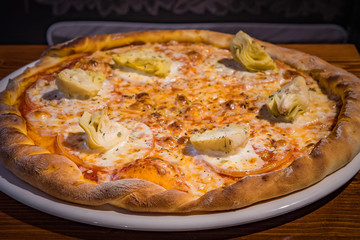 Very tasty pizza in a cafe restaurant