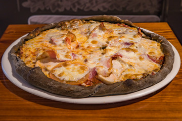 Very tasty pizza in a cafe restaurant
