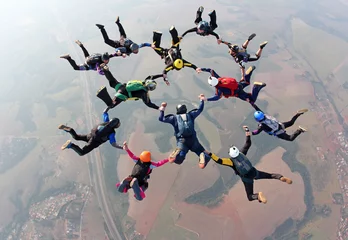 Fototapeten Skydiving team wotk © Mauricio G