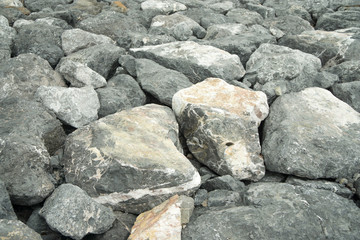 texture black stone rock at coast