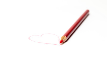 Drawn heart with red pencil