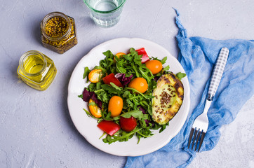 Raw arugula with vegetables