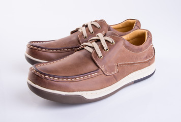 shoe or brown color men's shoes on a background.
