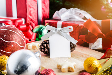 Empty tag with Festive Decoration, Christmas and New Year on wooden table