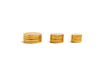 Pile of golden coins on isolated white bakcground,financial concept
