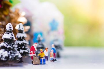 Children are waiting for a gift from Santa Cross, using as on Christmas day.