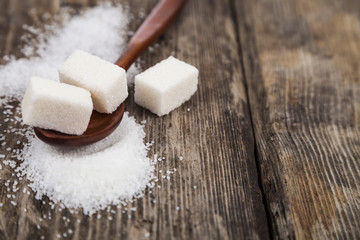 Wooden spoon with sugar