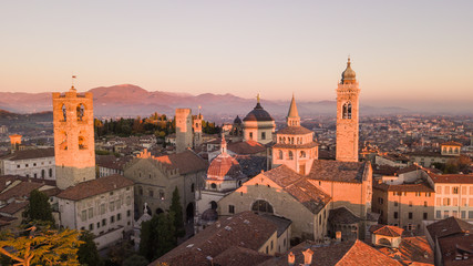 Bergamo, Italy. Drone aerial view of the Old city. One of the beautiful city in Italy. Landscape on the city center and the historical buildings during the sunset