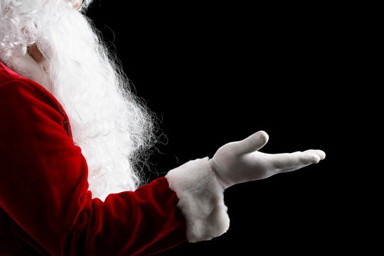 Santa Claus hand presenting isolated on white background