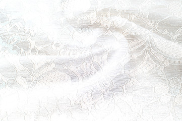Texture background image, white background with lace flower. Texture background pattern. Lacy white fabric. White guipure, embroidery on fabric for a wedding dress, postcard, photo wallpapers, poster,
