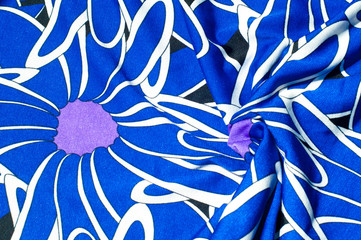 Texture, background, pattern. Women's blue silk dress. On an abstract illustration, white blue lilac tones