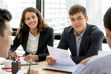 Russian business team having meeting with colleagues